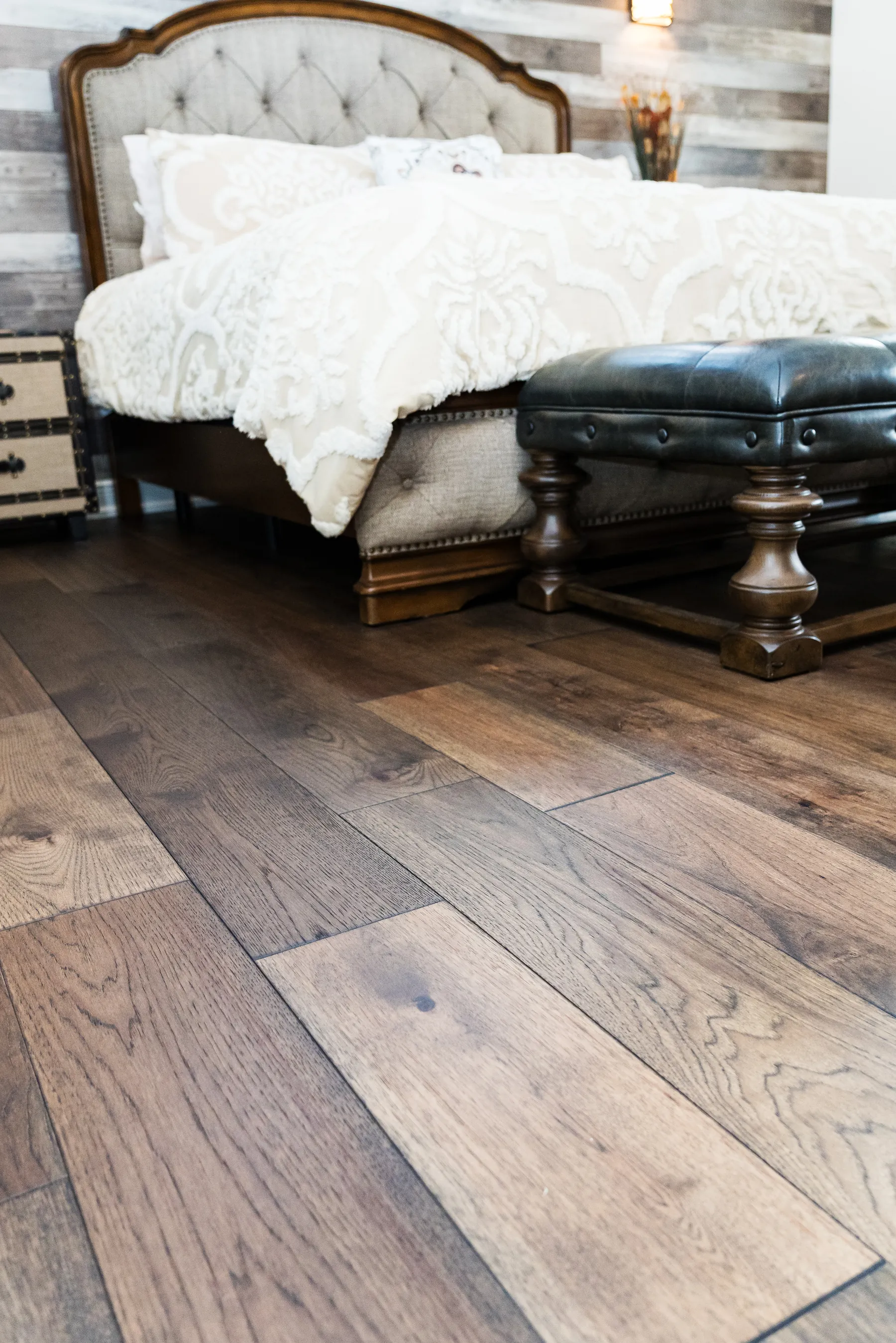 Hardwood bedroom with wood plank wall detail Holiday FL