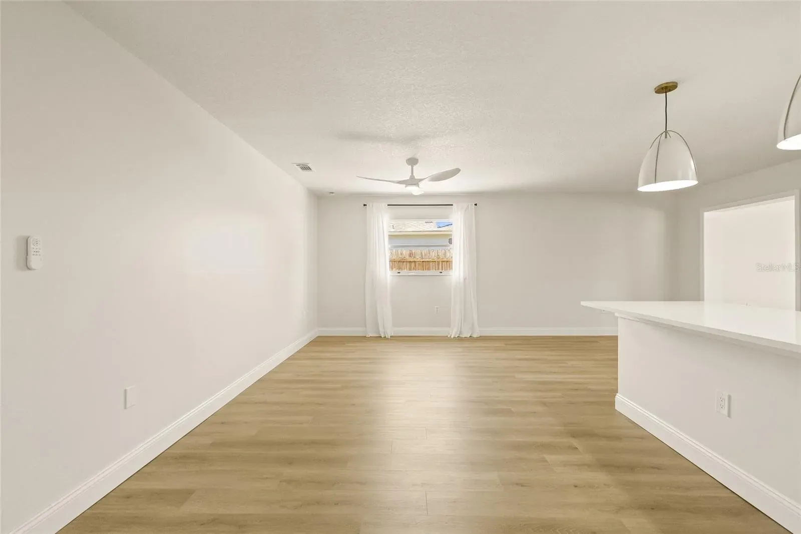 LVP living room kitchen island Holiday FL