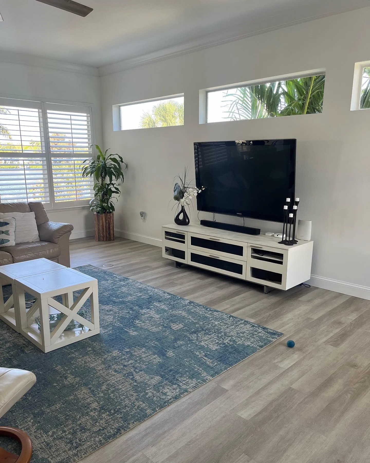 LVP living room plantation shutters Holiday FL