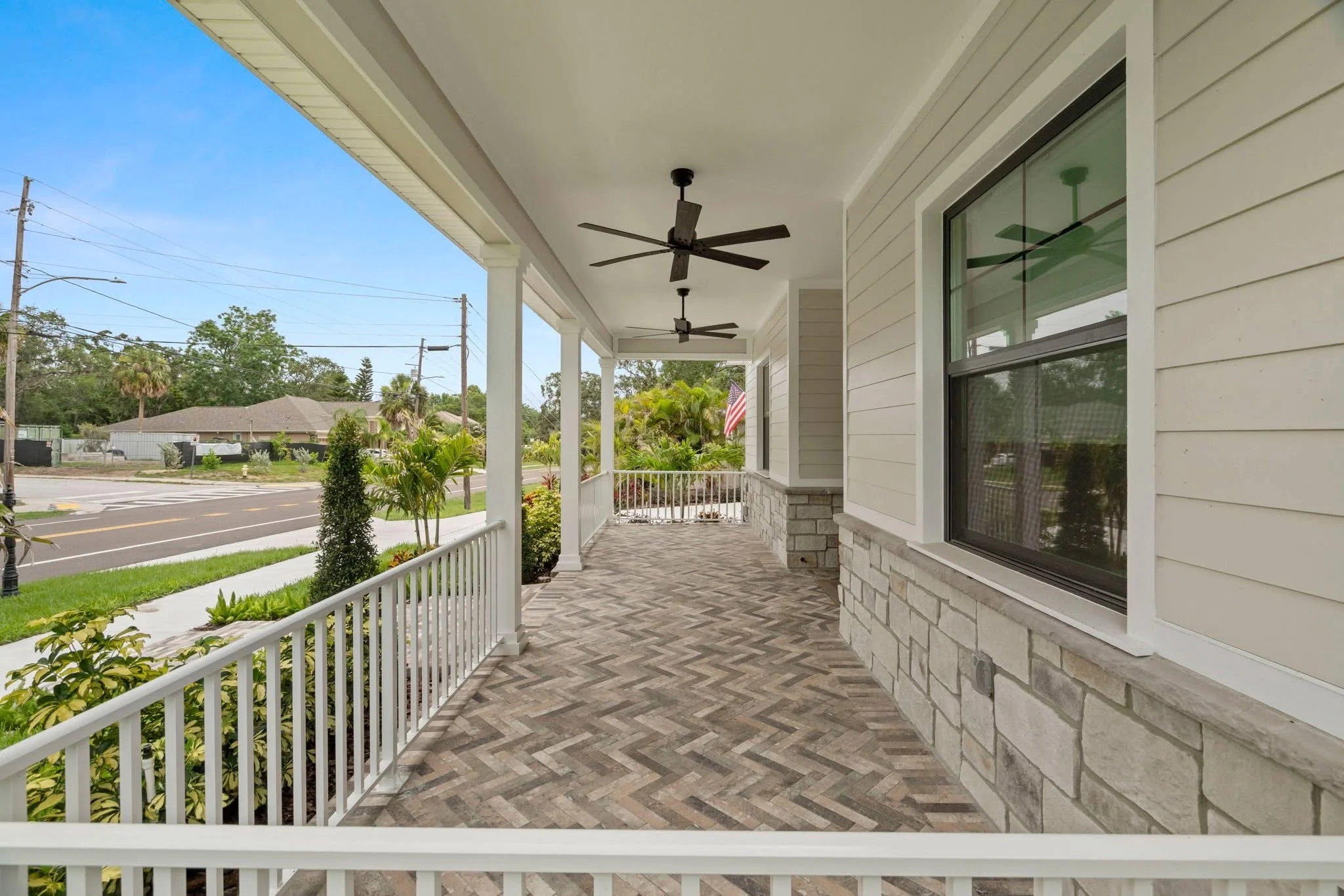 Herringbone tile front porch installation Holiday FL